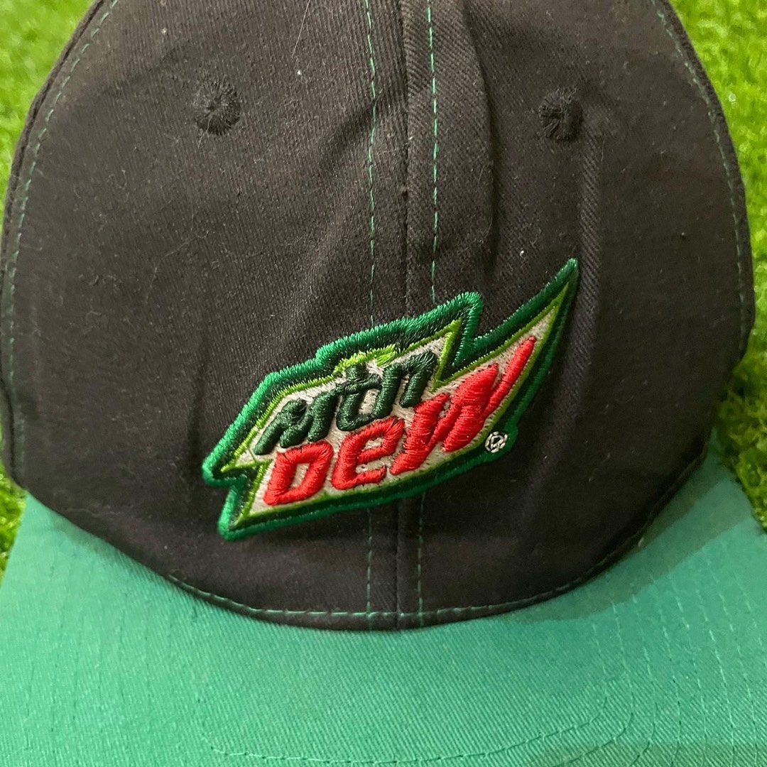 Vintage Mountain Dew Embroidered Logo Snapback Cap (Category: Caps & Hats) located in Quezon City. Submitted by emporium.vtg (Listing ID 1202452670, Image 3). Description: Vintage Mountain Dew Embroidered Big Logo Spell Out Black/Green Snapback Cap Mountain Dew Tag Great condition.