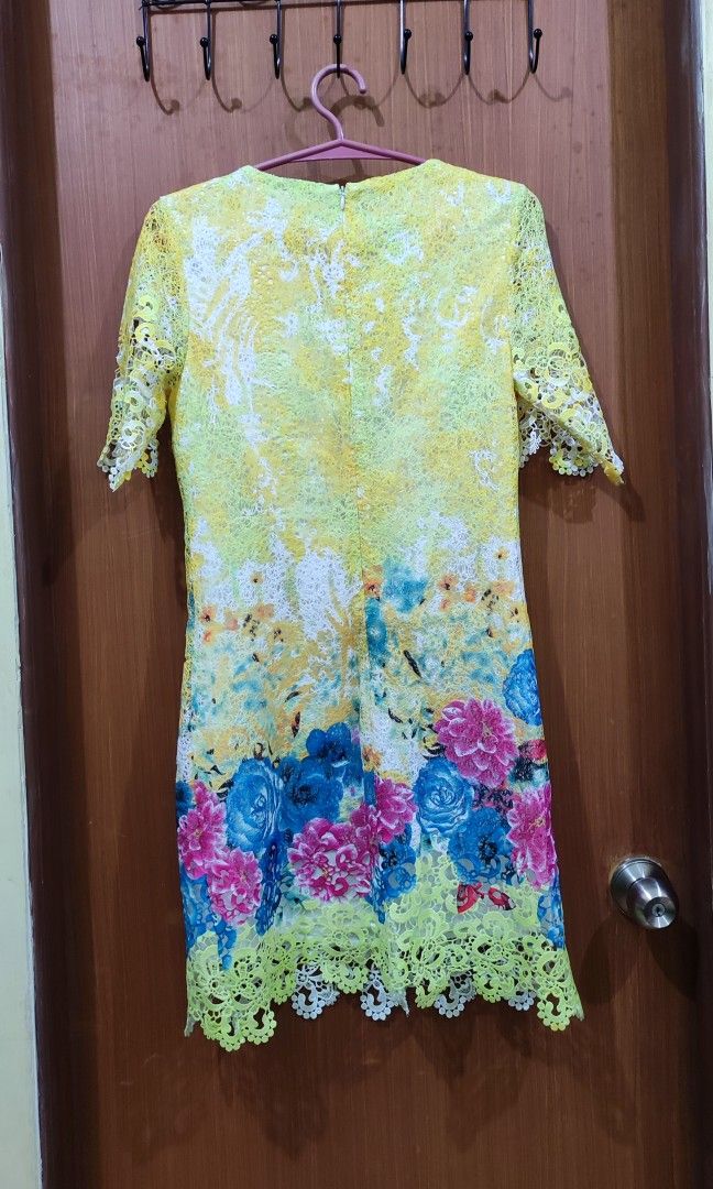 Yellow embroidered dress (Category: Dresses) located in Pasig City. Submitted by kaye.pb (Listing ID 1202363994, Image 2). Description: length 34" waist 32" zipper on the back size small to medium.
