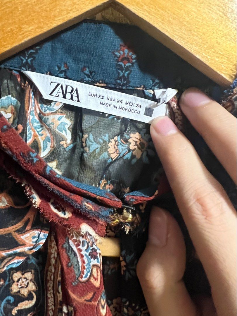 ZARA PRINTED LONG SLEEVES WITH RUFFLE DETAILS (Category: Blouses) located in Manila. Submitted by offbeyondph (Listing ID 1202478006, Image 2). Description: Fits xs to small.