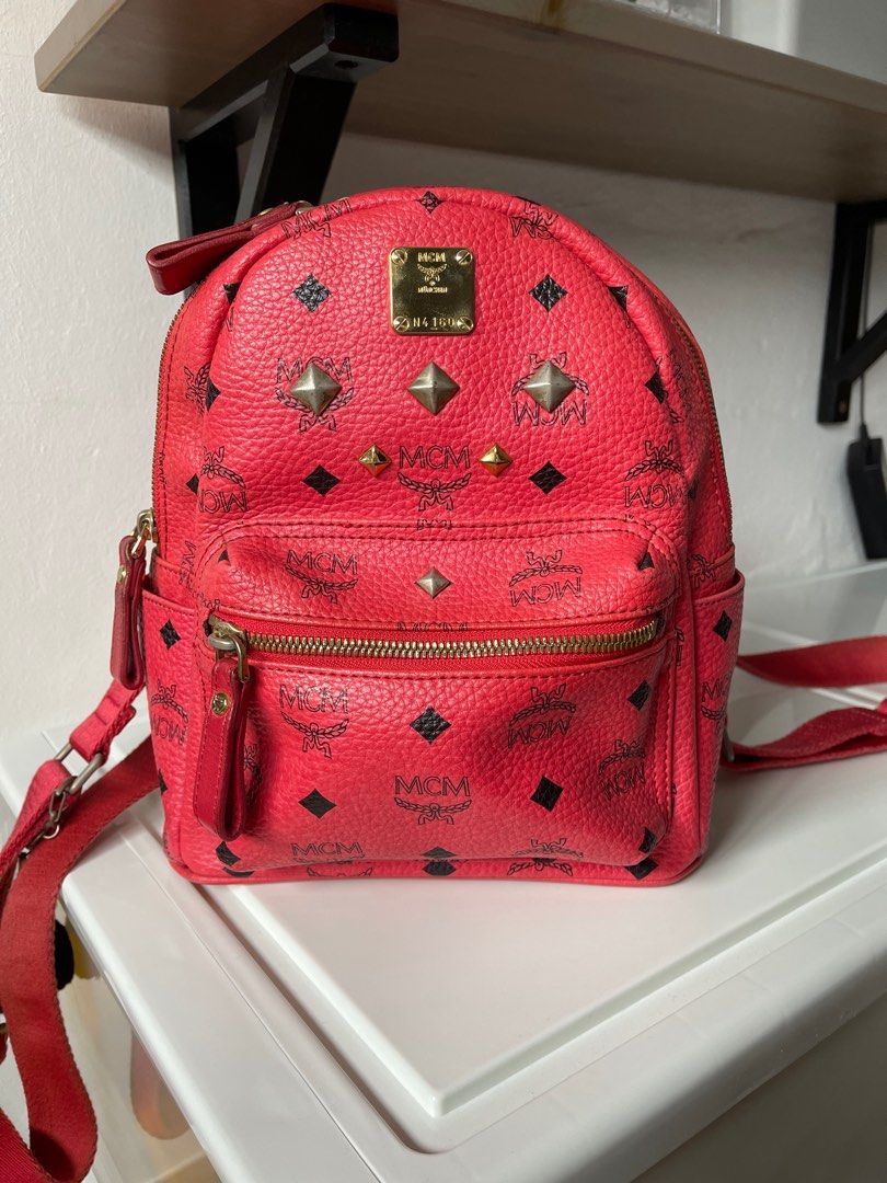 Ruby red mcm backpack shop