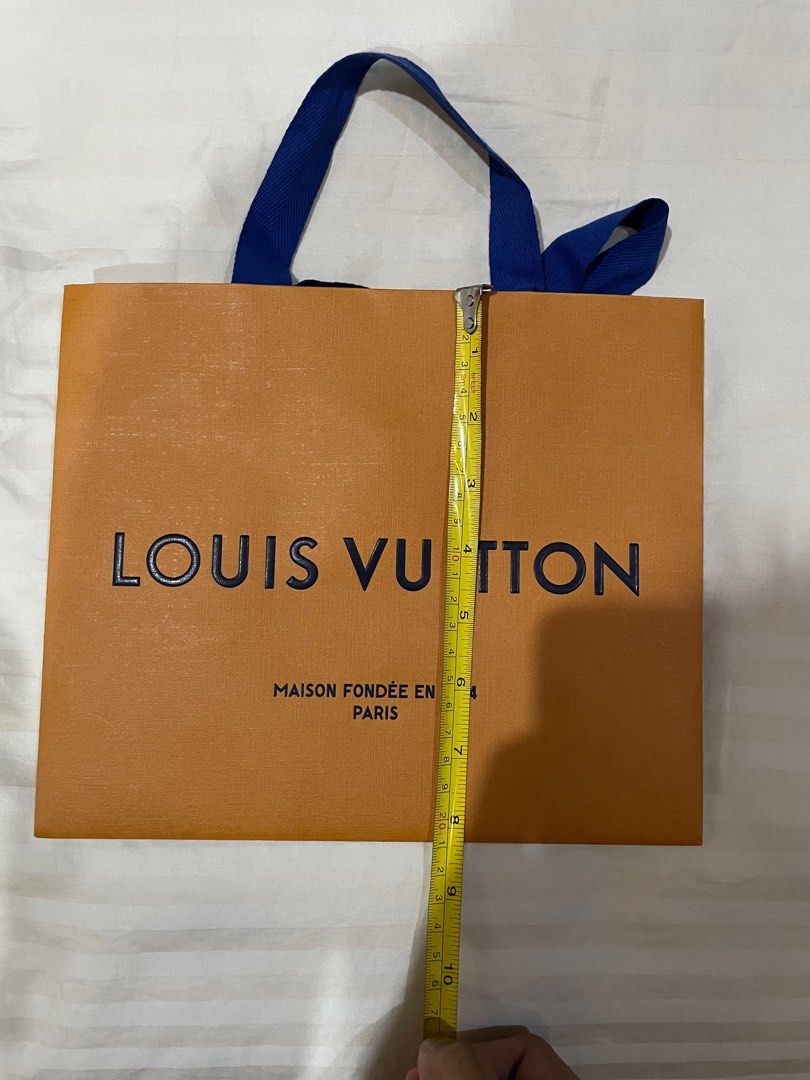 Original Louis Vuitton Paper Bag (Category: Luxury Bags & Wallets) located in Rizal. Submitted by raffyposas (Listing ID 1202602829, Image 2). Description: Original Louis Vuitton Paper Bag 600 pesos See photos for size reference DM If interested Thank you!.