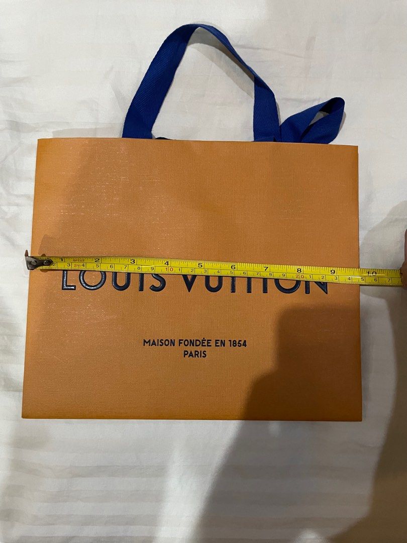Original Louis Vuitton Paper Bag (Category: Luxury Bags & Wallets) located in Rizal. Submitted by raffyposas (Listing ID 1202602829, Image 3). Description: Original Louis Vuitton Paper Bag 600 pesos See photos for size reference DM If interested Thank you!.