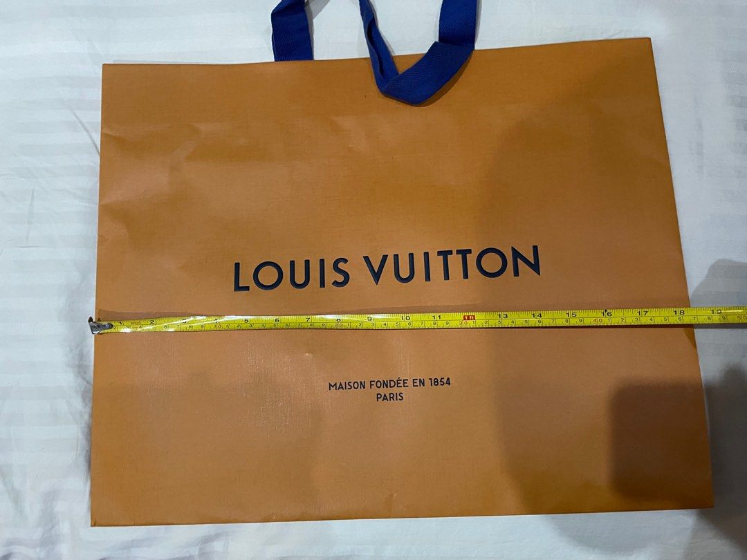 Original Louis Vuitton Paper Bag (Category: Luxury Bags & Wallets) located in Rizal. Submitted by raffyposas (Listing ID 1202603932, Image 2). Description: Original Louis Vuitton Paper Bag 900 pesos See photos for size reference DM If interested Thank you!.