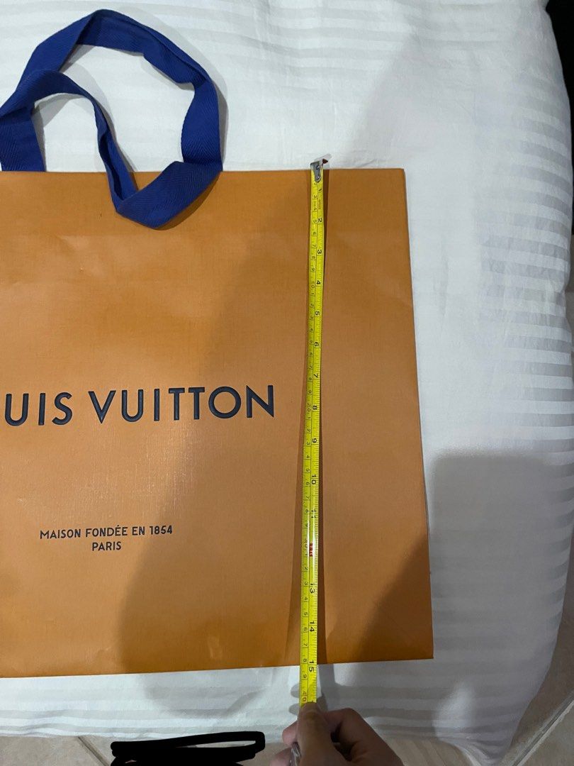 Original Louis Vuitton Paper Bag (Category: Luxury Bags & Wallets) located in Rizal. Submitted by raffyposas (Listing ID 1202603932, Image 3). Description: Original Louis Vuitton Paper Bag 900 pesos See photos for size reference DM If interested Thank you!.