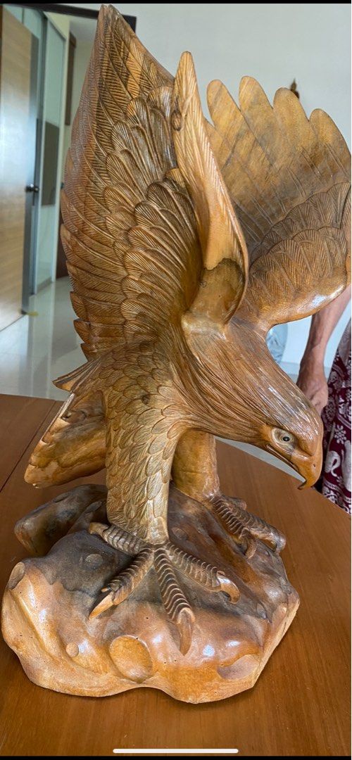 Solid wooden eagle (Category: Homes & Other Pet Accessories) located in Singapore. Submitted by 3012 (Listing ID 1202494710, Image 2). Description: Selling a unique solid wooden eagle Big size & heavy Not hollow type Rare piece & selling with heavy heart .