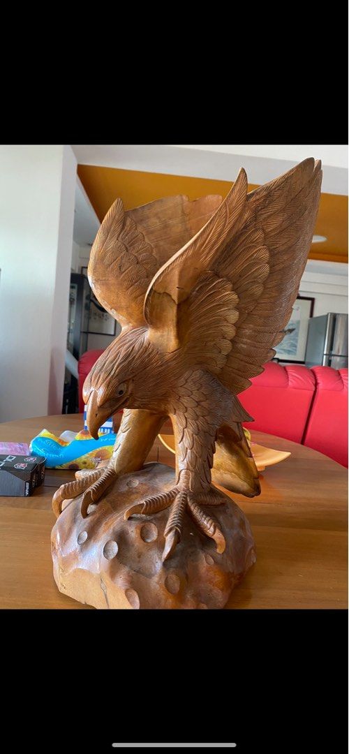 Solid wooden eagle (Category: Homes & Other Pet Accessories) located in Singapore. Submitted by 3012 (Listing ID 1202494710, Image 1). Description: Selling a unique solid wooden eagle Big size & heavy Not hollow type Rare piece & selling with heavy heart .