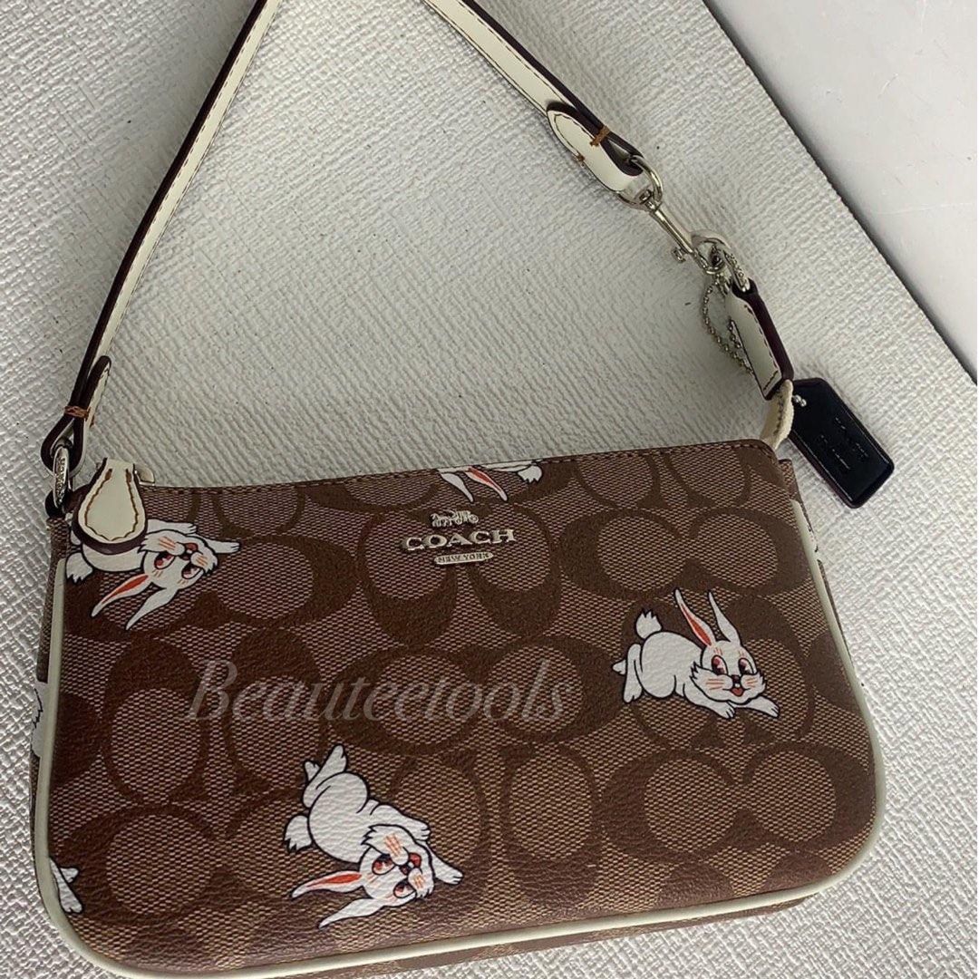 ( NEW ARRIVAL ) Coach Nolita white rabbit, Women's Fashion, Bags ...