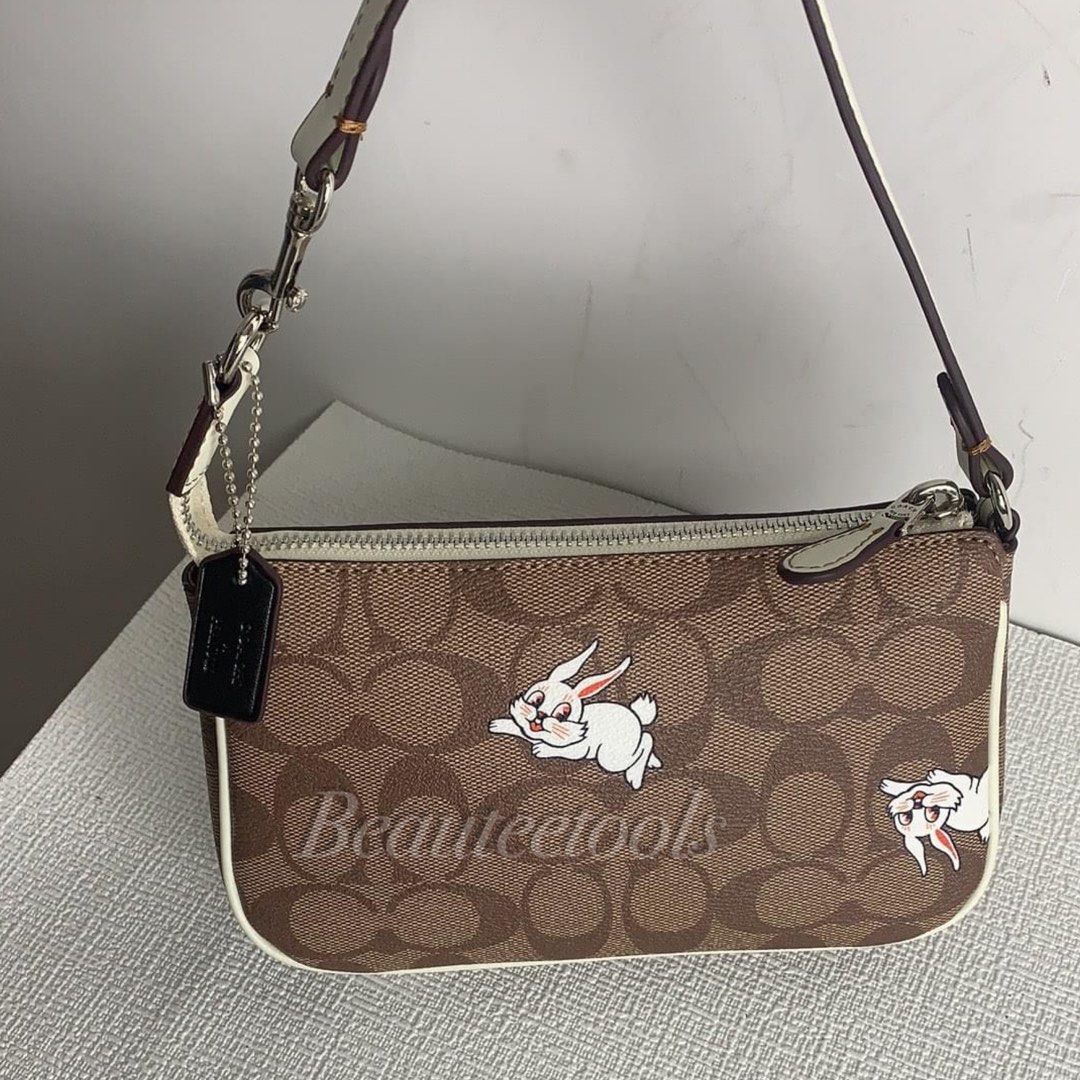 ( NEW ARRIVAL ) Coach Nolita white rabbit, Women's Fashion, Bags ...