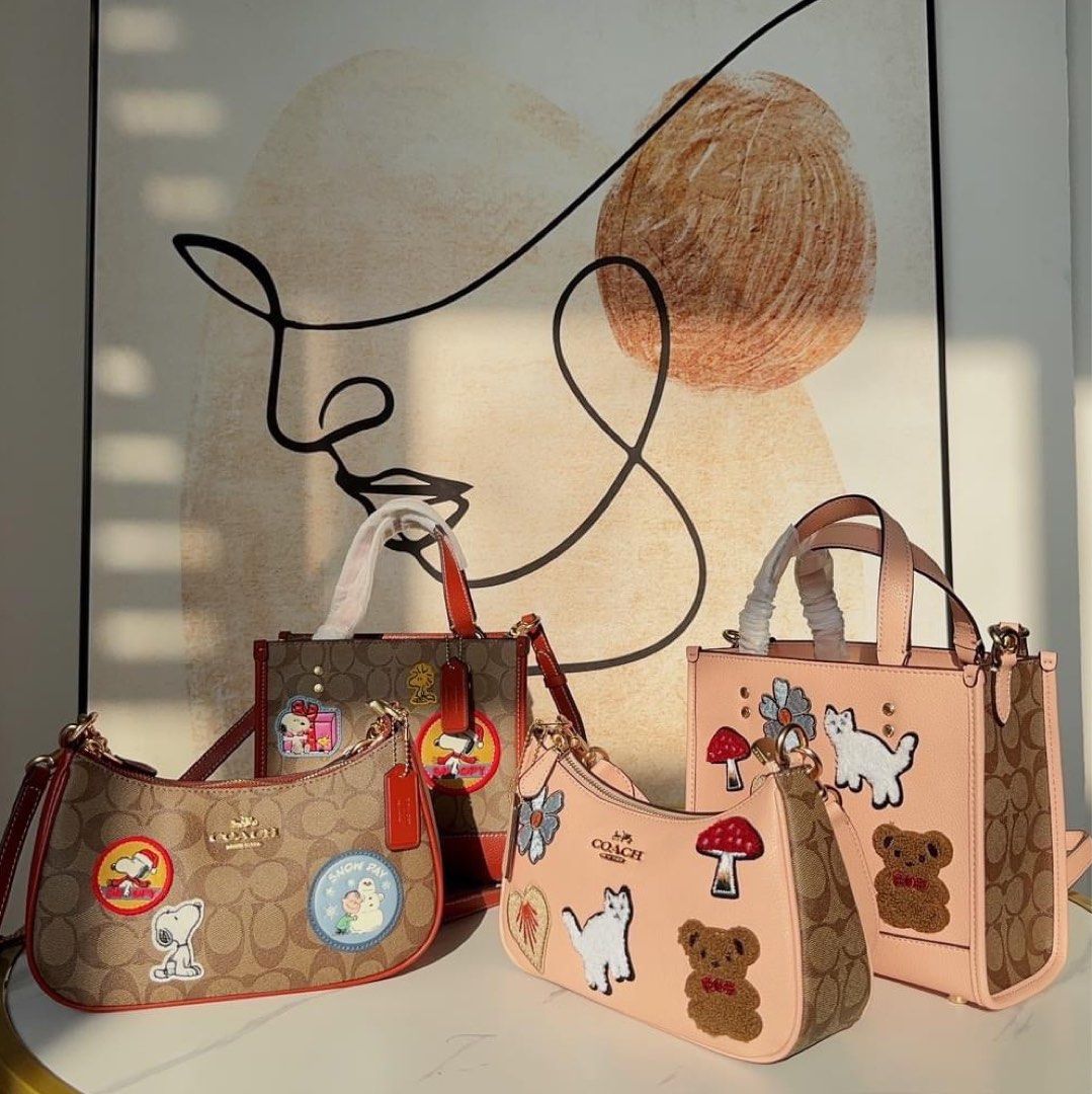 Coach bag with cats sales