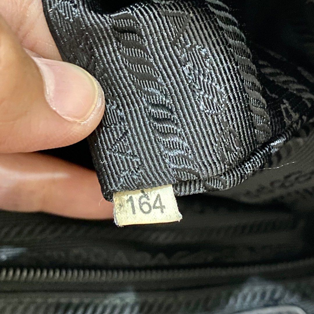 Prada serial number inside bag hot sale