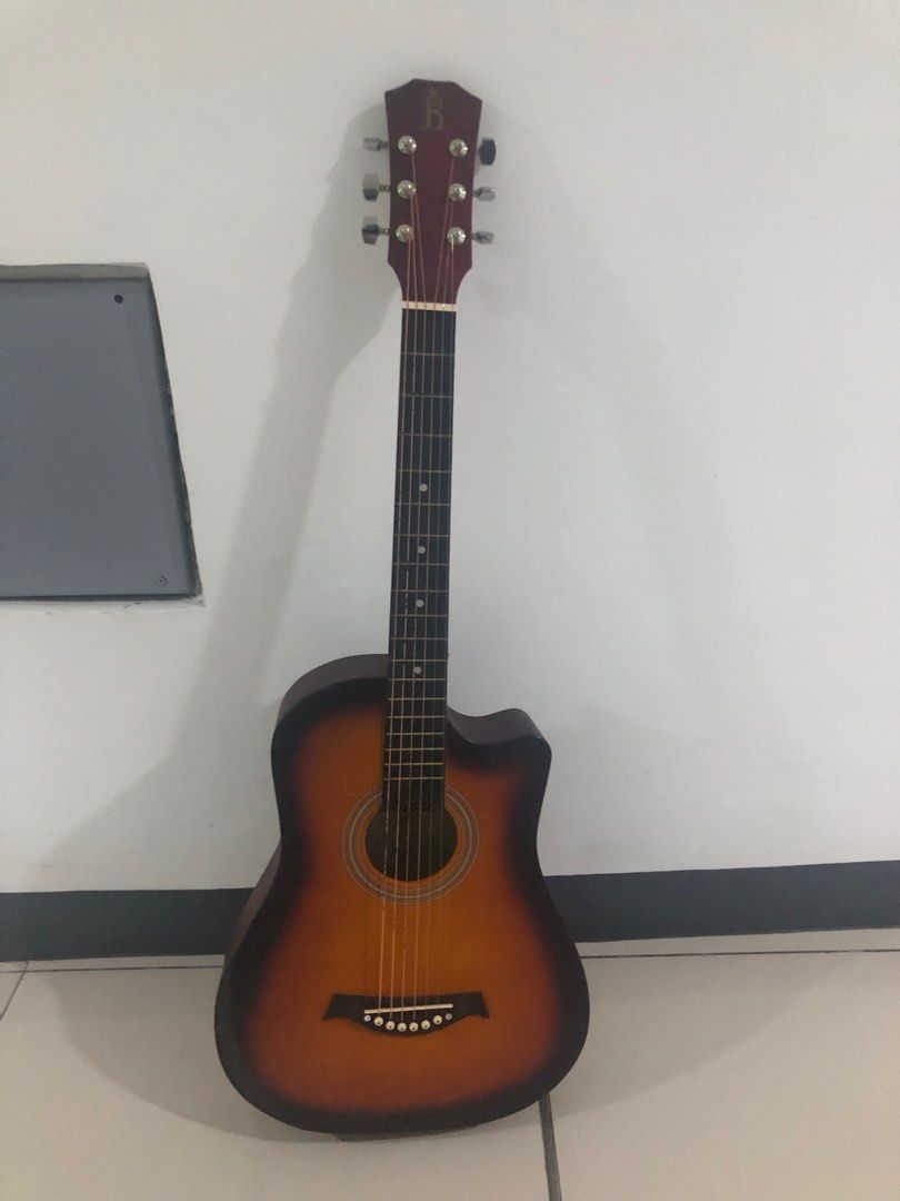 Black and cheap brown guitar