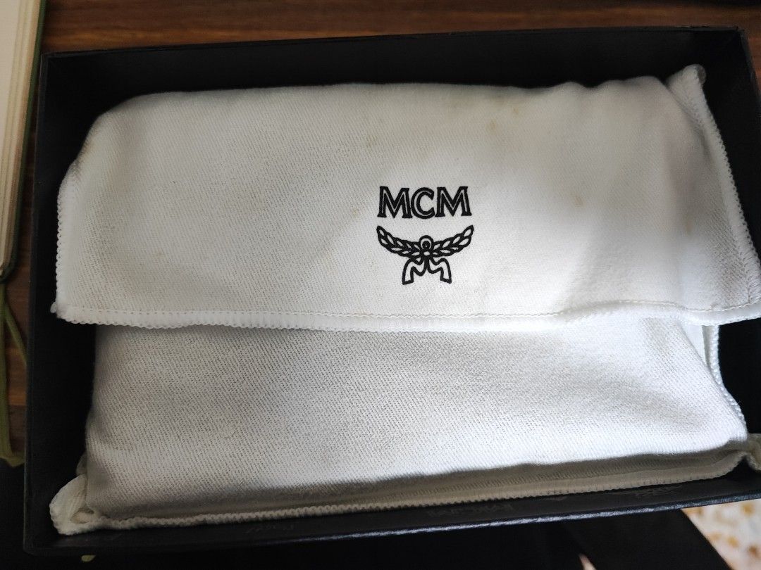 Mcm best sale wrist pouch