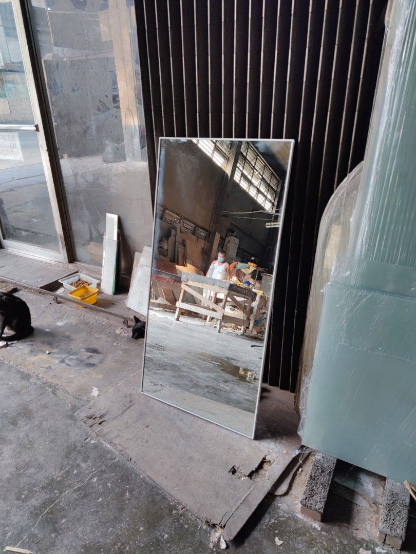 Rectangular mirror with frame (Category: Mirrors) located in Malabon City. Submitted by mirrors.ph (Listing ID 1202783622, Image 2). Description: Rectangular mirror with white aluminum frame and plywood backing. Using 6mm thick copper free mirror Size: 2ft x 4ft P2160 Add P200 if with back hook Available colors gold, glossy black, matte black, white and silver aluminum frame. Customize sizes and shapes are welcome..