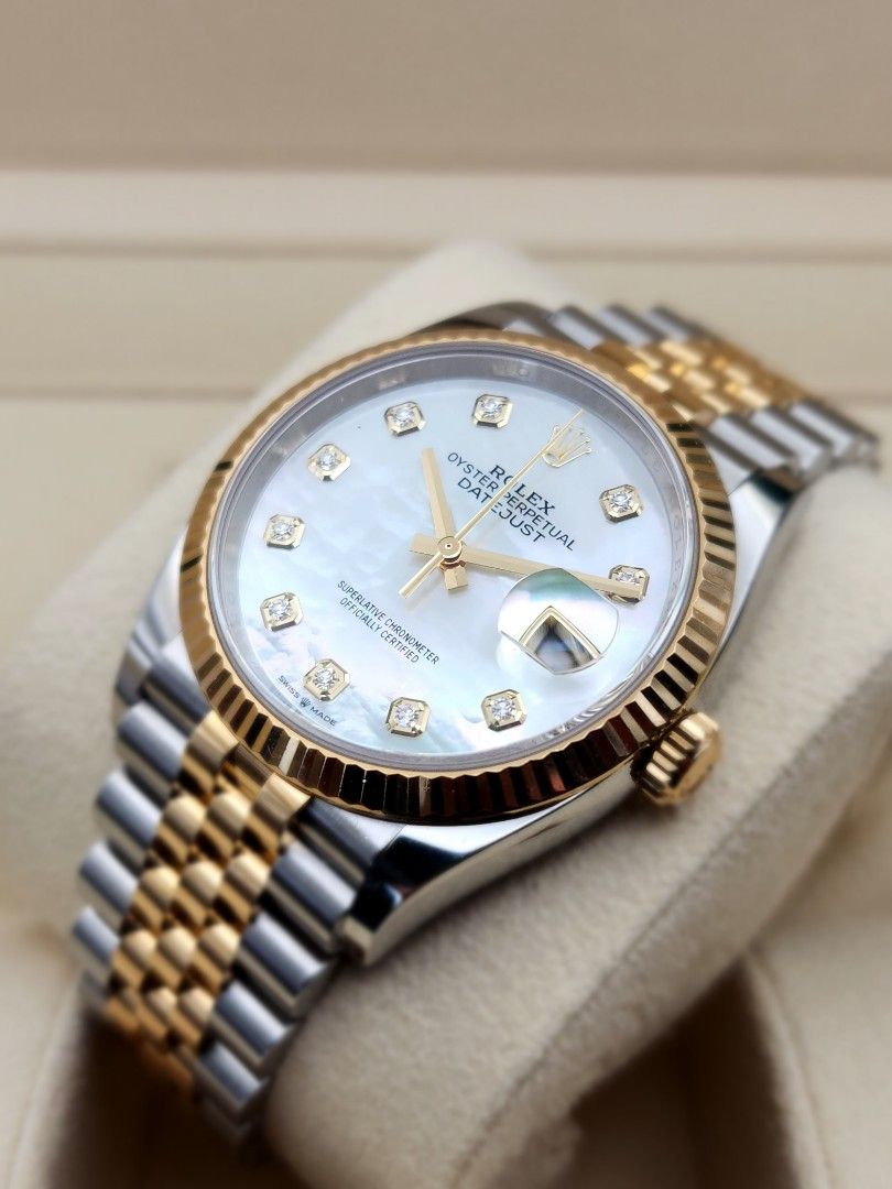 Rolex datejust mother discount of pearl price