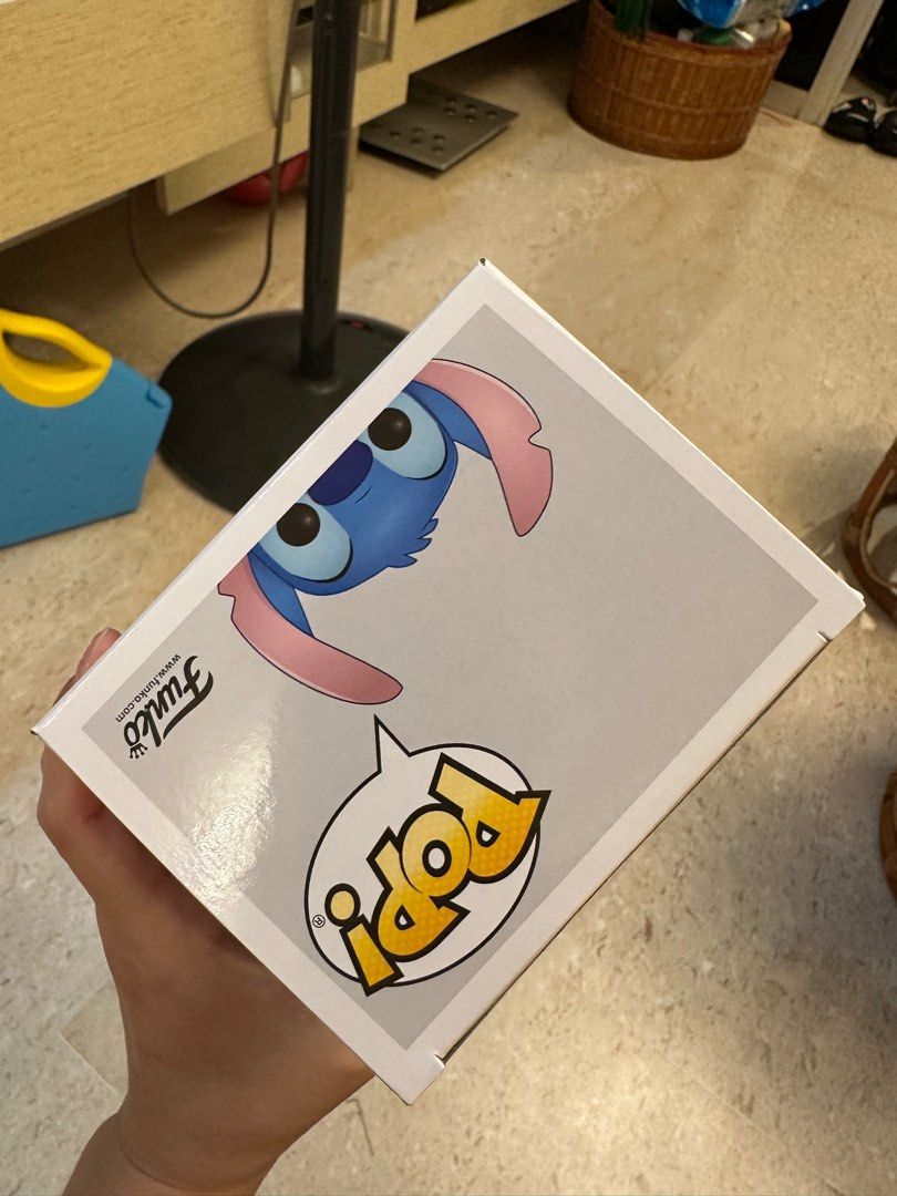 funko pop stitch on tricycle