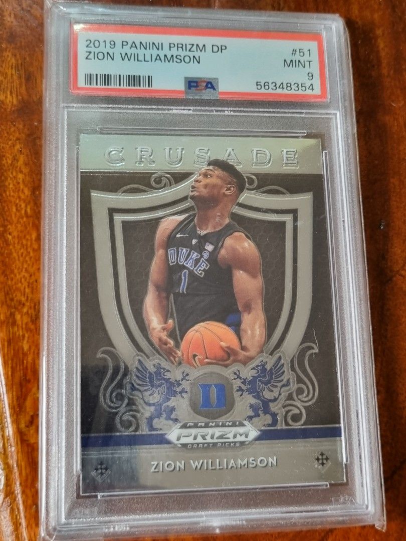 Zion Williamson RC Graded Slab PSA 9 Panini Crusade Prizm Draft Picks (Category: Graded Singles) located in Silang. Submitted by samflores2k4t7 (Listing ID 1202786554, Image 1). Description: For sale 2019 RC Panini Crusade Prizm Draft Picks #51 Zion "Boy Kaldag" Williamson PSA 9 Graded slab.