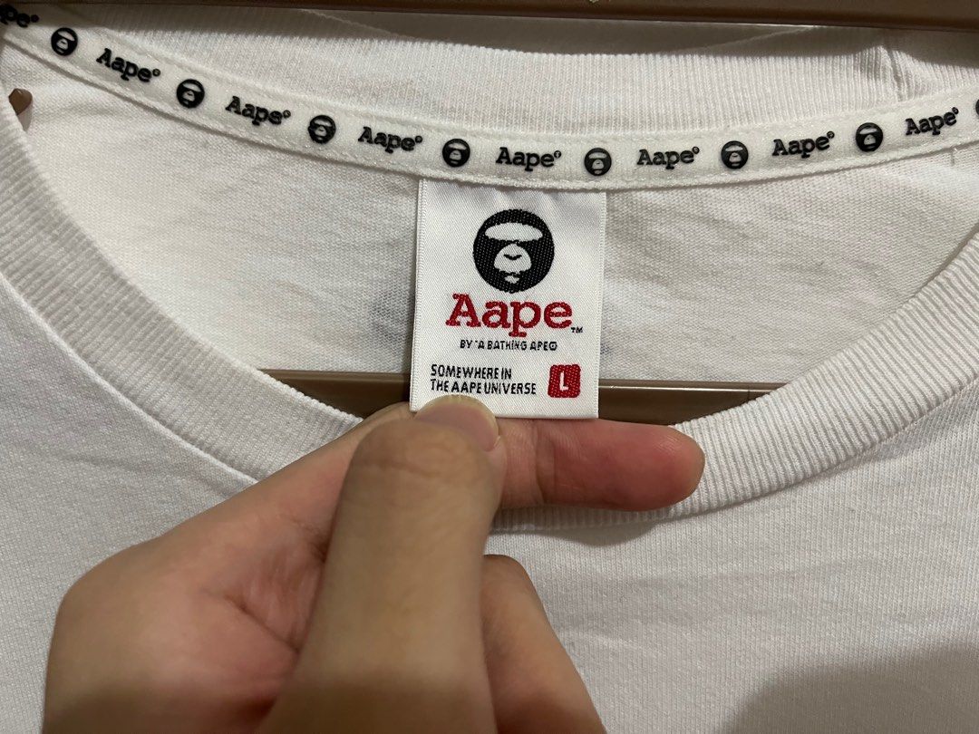 BAPE shirt (Category: Tshirts & Polo Shirts ) located in Quezon City. Submitted by jmartph (Listing ID 1203042378, Image 3). Description: Aape By A Bathing Ape (authentic) Rare piece 100% legit Bought from sneaker box Manila Original price was ₱6,000. Now only selling for ₱3,500! Only used twice Negotiable! RFS: didn’t plan to wear anymore and was kept in the closet. .