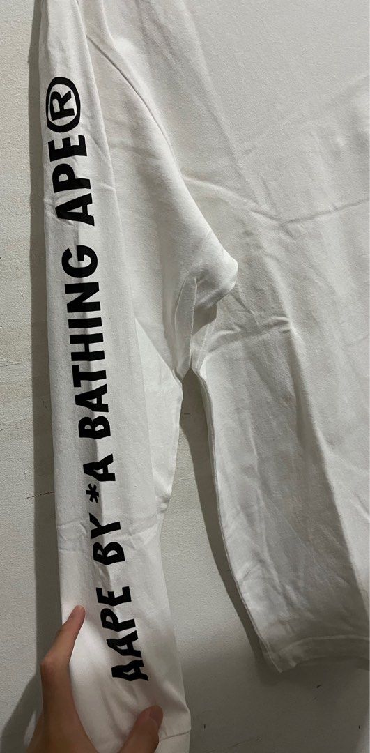 BAPE shirt (Category: Tshirts & Polo Shirts ) located in Quezon City. Submitted by jmartph (Listing ID 1203042378, Image 2). Description: Aape By A Bathing Ape (authentic) Rare piece 100% legit Bought from sneaker box Manila Original price was ₱6,000. Now only selling for ₱3,500! Only used twice Negotiable! RFS: didn’t plan to wear anymore and was kept in the closet. .