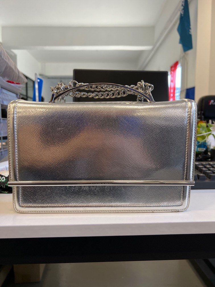 Charles Keith Chrome Clutch Bag