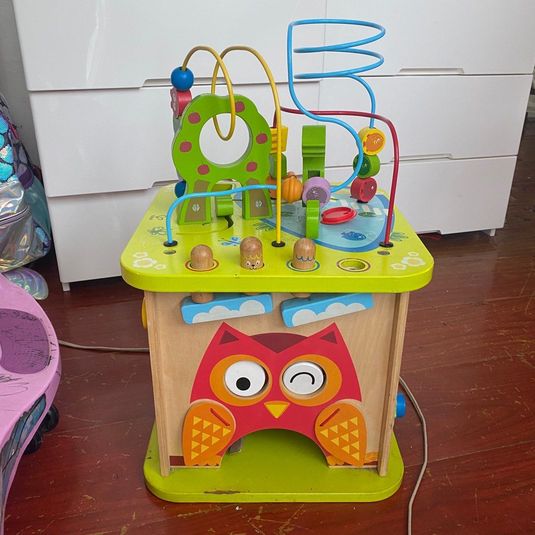 Hape activity center (Category: Infant Playtime) located in Quezon City. Submitted by martinafernandez (Listing ID 1202975426, Image 1). Description: 2 pieces are missing. Negotiable. Inclusions shown in picts.