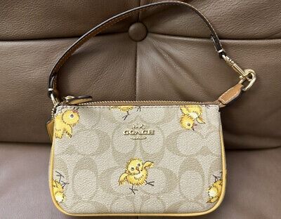 Coach Nolita 15 In Signature Canvas With Tossed Chick Print