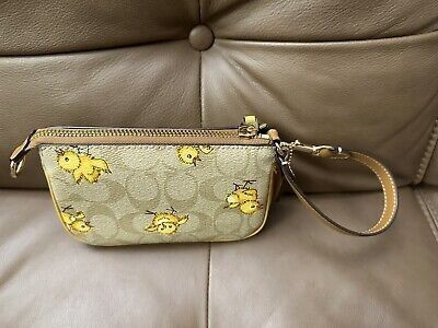 Coach Nolita 15 in Signature Canvas with Tossed Chick Print