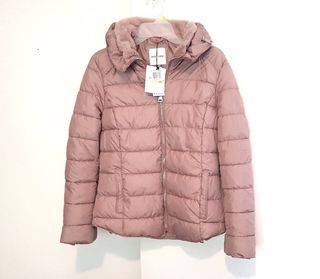 Soft pink winter puffer jacket with faux fur trim and hood
