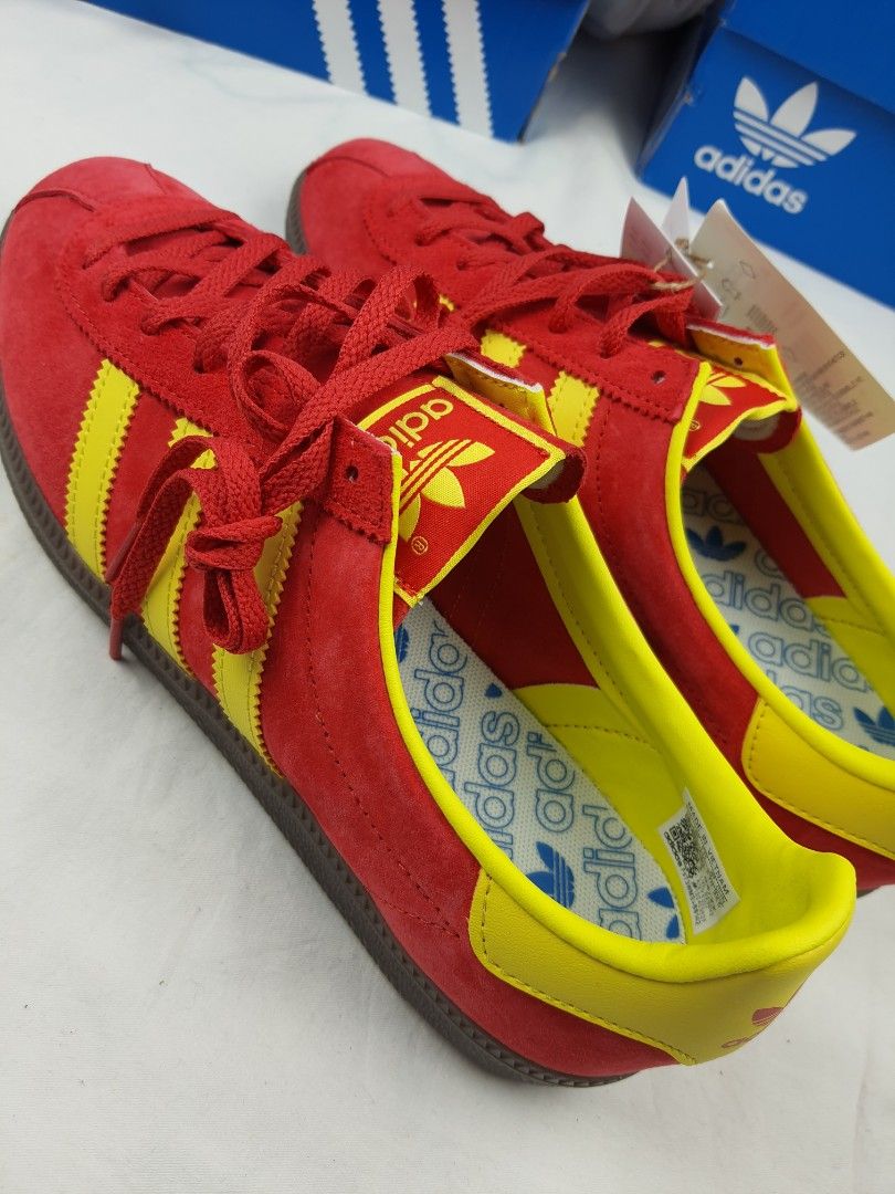 Red and yellow deals adidas trainers