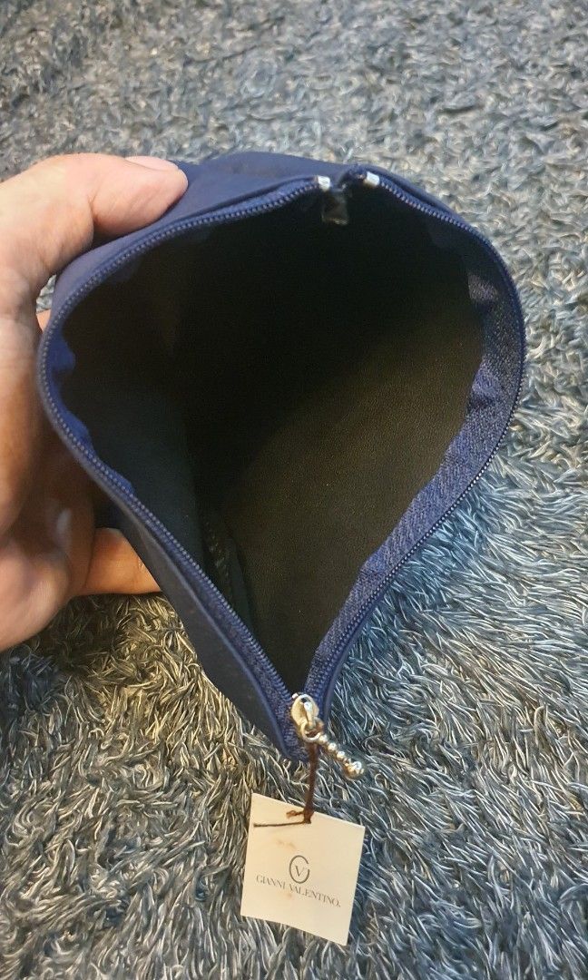 Authentic gianni valentino pouch (Category: Luxury Bags & Wallets) located in Cavite. Submitted by ohmie23 (Listing ID 1203149143, Image 2). Description: Authentic gianni valentino pouch.