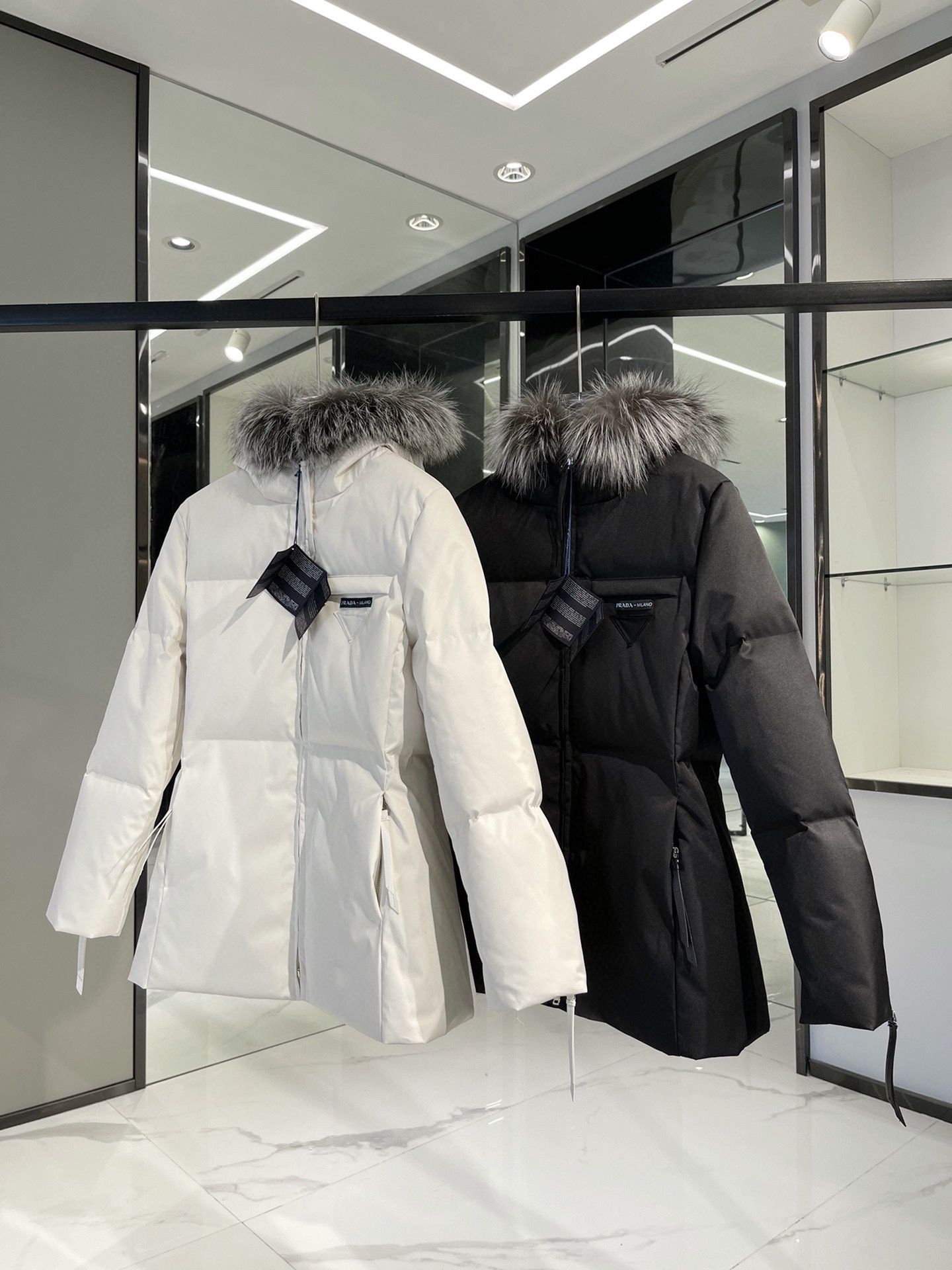 Authentic Prada Triangular Logo Luxurious Silver Fox Fur Collar Mid Length Down Jacket Women s Fashion Coats Jackets and Outerwear on Carousell