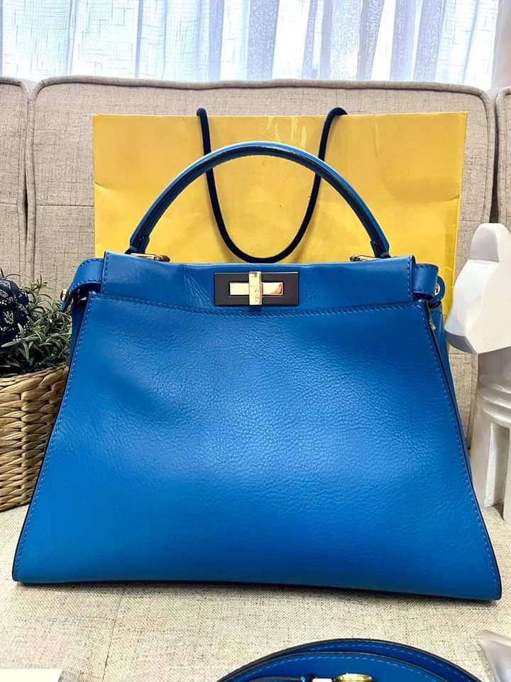 Fendi Peekaboo Medium Blue (Category: Luxury Bags & Wallets) located in Manila. Submitted by bagislifeshop (Listing ID 1203263950, Image 2). Description: Searching for Peekaboo? We got you!!! 💙💙💙 On Hand in PH 🇵🇭 100% Authentic Fendi Peekaboo Medium Blue Condition: 9/10 Comes with Standard Dustbag, Booklet, Tags and Strap.