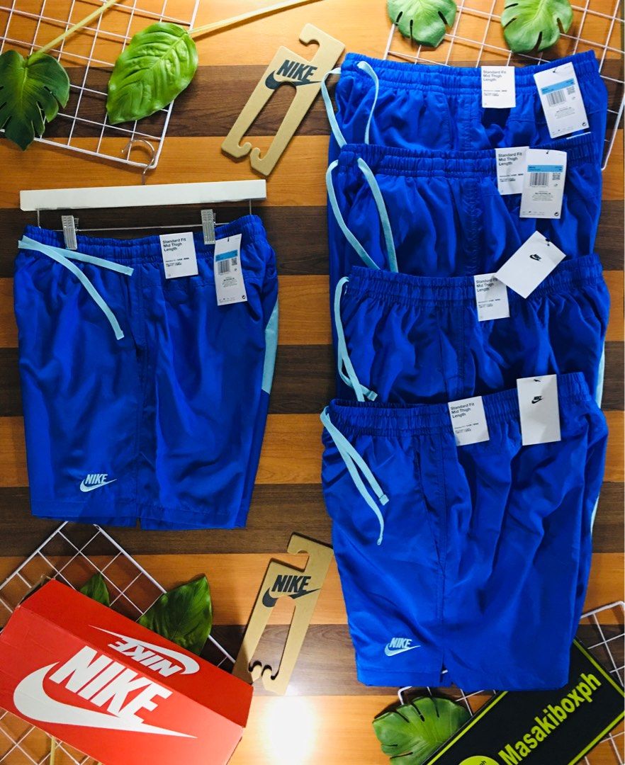 royal blue nike woven shorts