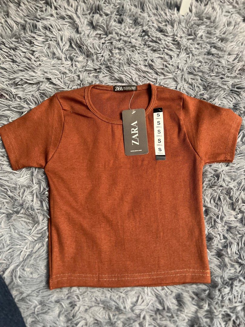 Zara Ribbed Top (Category: Shirts) located in Quezon City. Submitted by bubbleg3m (Listing ID 1203168829, Image 1). Description: 🍷💐Selling💐🍷 Zara Ribbed Top 🍭Basic 🍭brand new no flaws Fits S I give discount for 2 orders up just send me a msg💌.