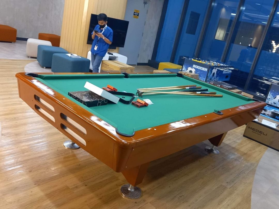 Brown Billiard table w/ complete accessories (Category: Billiards and Bowling) located in San Pablo. Submitted by rbreyessportstrading (Listing ID 1203341107, Image 1). Description: 📣FOR SALE ‼️‼️ 📣FOR SALE ‼️‼️ 📣FOR SALE‼️‼️ BRANDNEW BLACK BILLIARD TABLE 💸 PHP 95,000 💸 ✅ SPECS : ✅ 🎱 Eco 4 wood type 🎱 Varnished Finished 🎱 Consulate Model 🎱 Adjustable leg 🎱 Solid wood 🎱 Size: 5x9ft. 🎱 Slate: Marble 🎱 Cushion: Banda K66 🎱 Corner Pocke