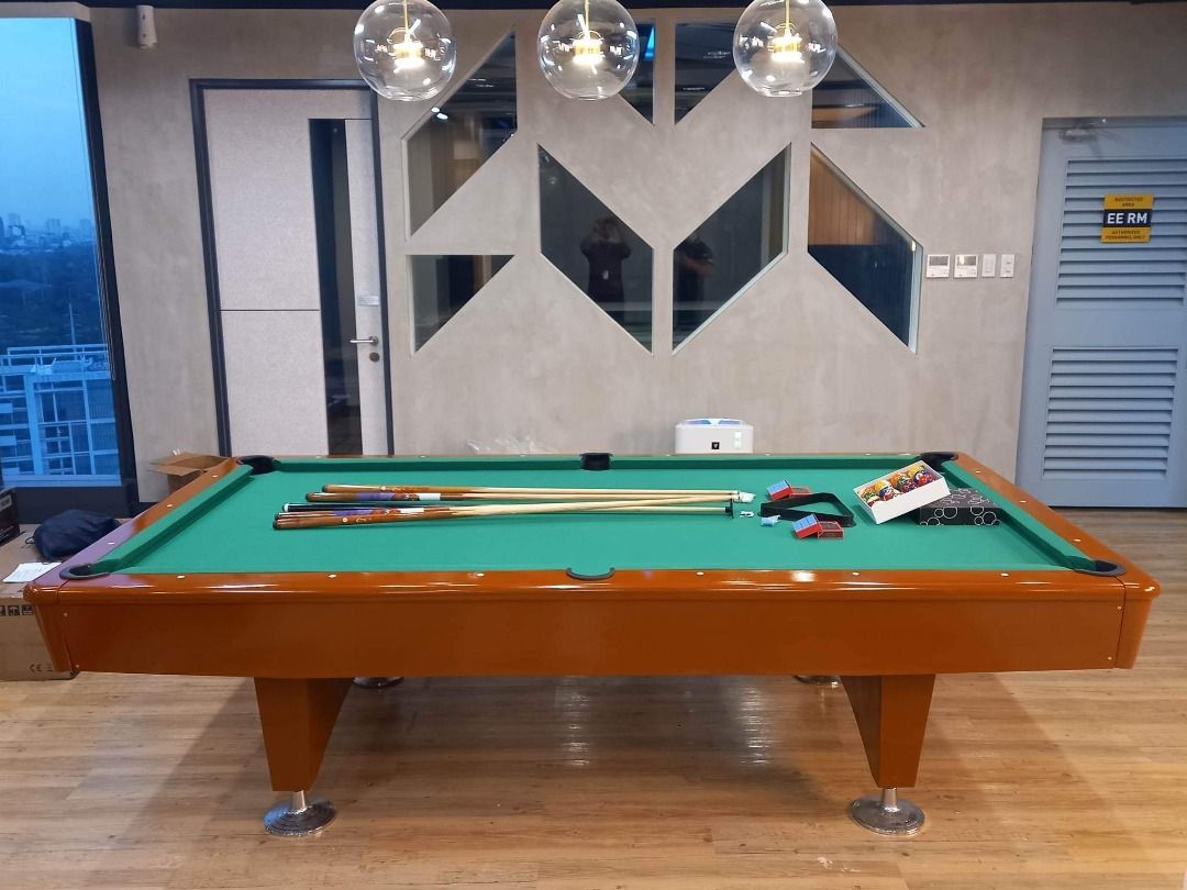 Brown Billiard table w/ complete accessories (Category: Billiards and Bowling) located in San Pablo. Submitted by rbreyessportstrading (Listing ID 1203341107, Image 3). Description: 📣FOR SALE ‼️‼️ 📣FOR SALE ‼️‼️ 📣FOR SALE‼️‼️ BRANDNEW BLACK BILLIARD TABLE 💸 PHP 95,000 💸 ✅ SPECS : ✅ 🎱 Eco 4 wood type 🎱 Varnished Finished 🎱 Consulate Model 🎱 Adjustable leg 🎱 Solid wood 🎱 Size: 5x9ft. 🎱 Slate: Marble 🎱 Cushion: Banda K66 🎱 Corner Pocke