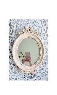 Off white vintage victorian mirror.