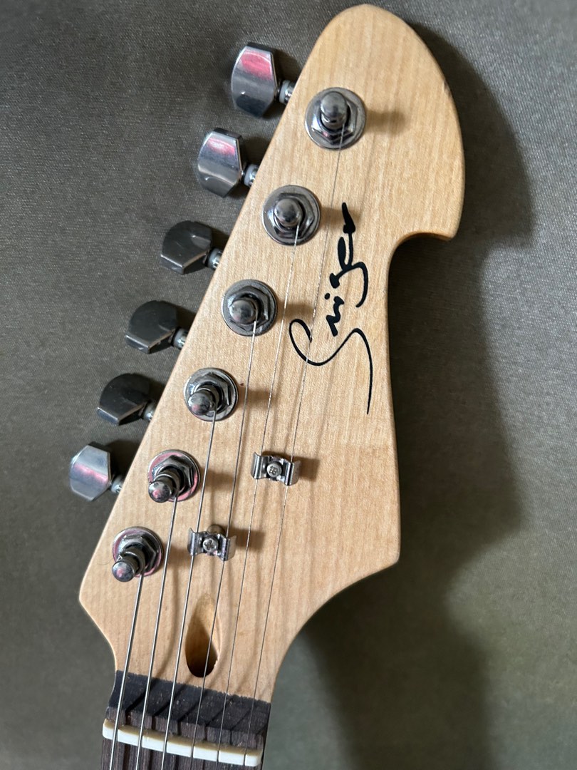 Singer guitar brand deals