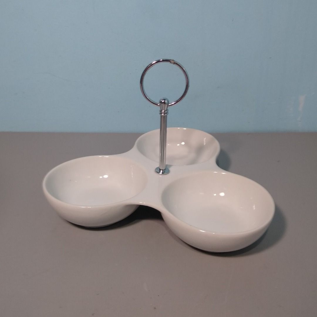 Small 3 Sections White Ceramic Table Snack Dish Serving Plate Appetizer with Handle from UK (Category: Other Kitchenware & Tableware) located in Las Pinas. Submitted by DSimple_Stuff (Listing ID 1203324137, Image 1). Description: - Porcelain Snack dish with Stainless Steel handle - Ideal for parties and entertaining - Adds appeal to your beautifully cooked dish - Or simply enjoy the variety of snacks that you can dish out - Serve any course of yo
