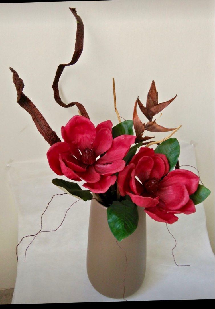 Specially designed artificial flowers arrangement in matching pot