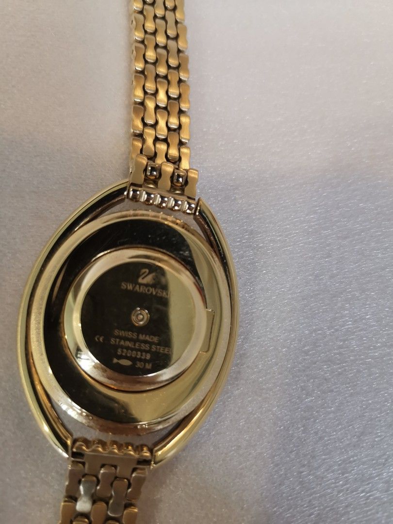 Swarovski Crystalline Aura watch in yellow gold Women s Fashion