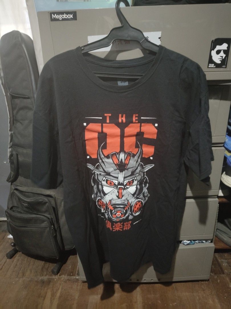 WWE AJ Styles The OC Shirt (Category: Tshirts & Polo Shirts ) located in Manila. Submitted by aaron_mnl (Listing ID 1203408746, Image 1). Description: Legit product, bought from WWEShop Size XL on tag Slim fit, could also fit L Design from 2020, until the Good Brothers were released honest issue: small hole, can be sewn to be unnoticeable.