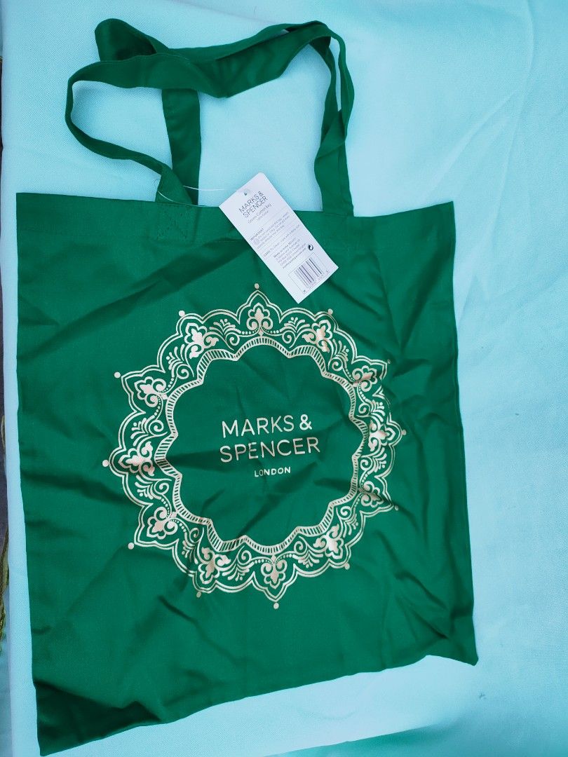 100% Authentic Marks & Spencer Tote Bag (Category: Tote Bags) located in Cainta. Submitted by engelinne (Listing ID 1203616036, Image 1). Description: 100% Original Marks & Spencer Tote Bag (Christmas green) - never been used, no smell - no issues, good condition - only 300 PHP limited edition tote bag, imported from Dubai - seller location is in Greenwoods, Cainta, Rizal.