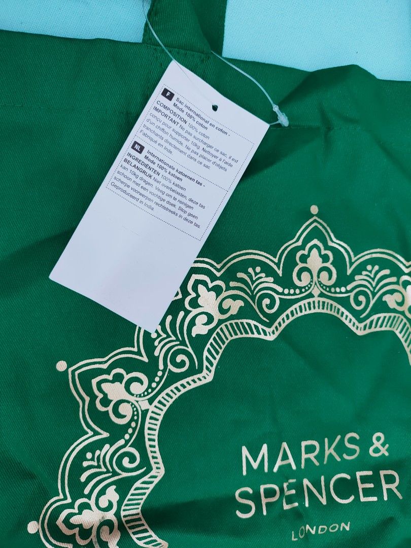 100% Authentic Marks & Spencer Tote Bag (Category: Tote Bags) located in Cainta. Submitted by engelinne (Listing ID 1203616036, Image 2). Description: 100% Original Marks & Spencer Tote Bag (Christmas green) - never been used, no smell - no issues, good condition - only 300 PHP limited edition tote bag, imported from Dubai - seller location is in Greenwoods, Cainta, Rizal.