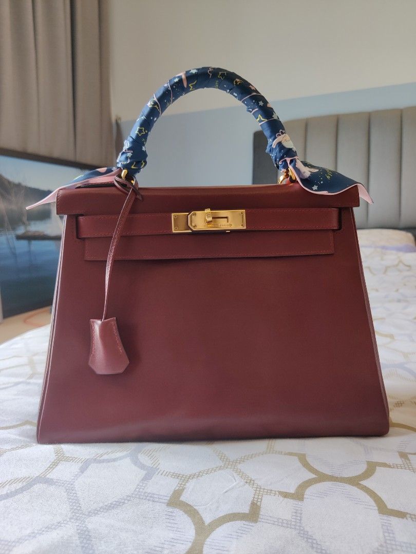 Amazing Hermes Kelly 28 sellier handbag strap in Rouge H box calf leather,  GHW at 1stDibs