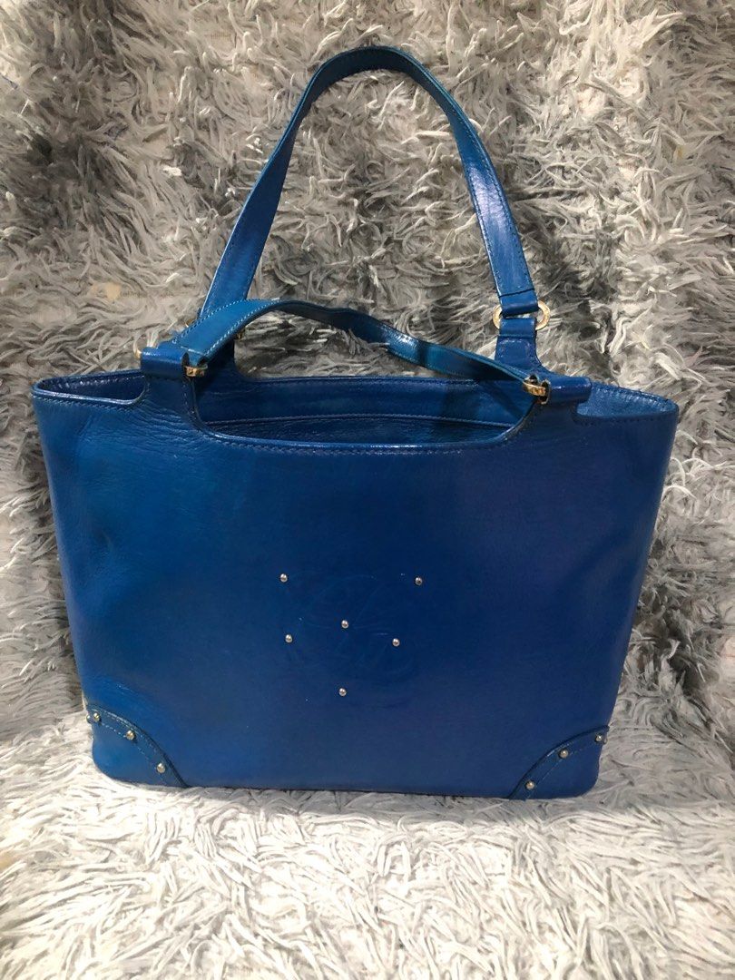 Louis Quatorze Medium size tote bag (Category: Luxury Bags & Wallets) located in Angono. Submitted by fhlor02 (Listing ID 1203733933, Image 1). Description: Louis Quatorze tote bag, stand alone structured bag, sturdy very good leather material, with normal signs of use, dimen: 9”by14”by4”.