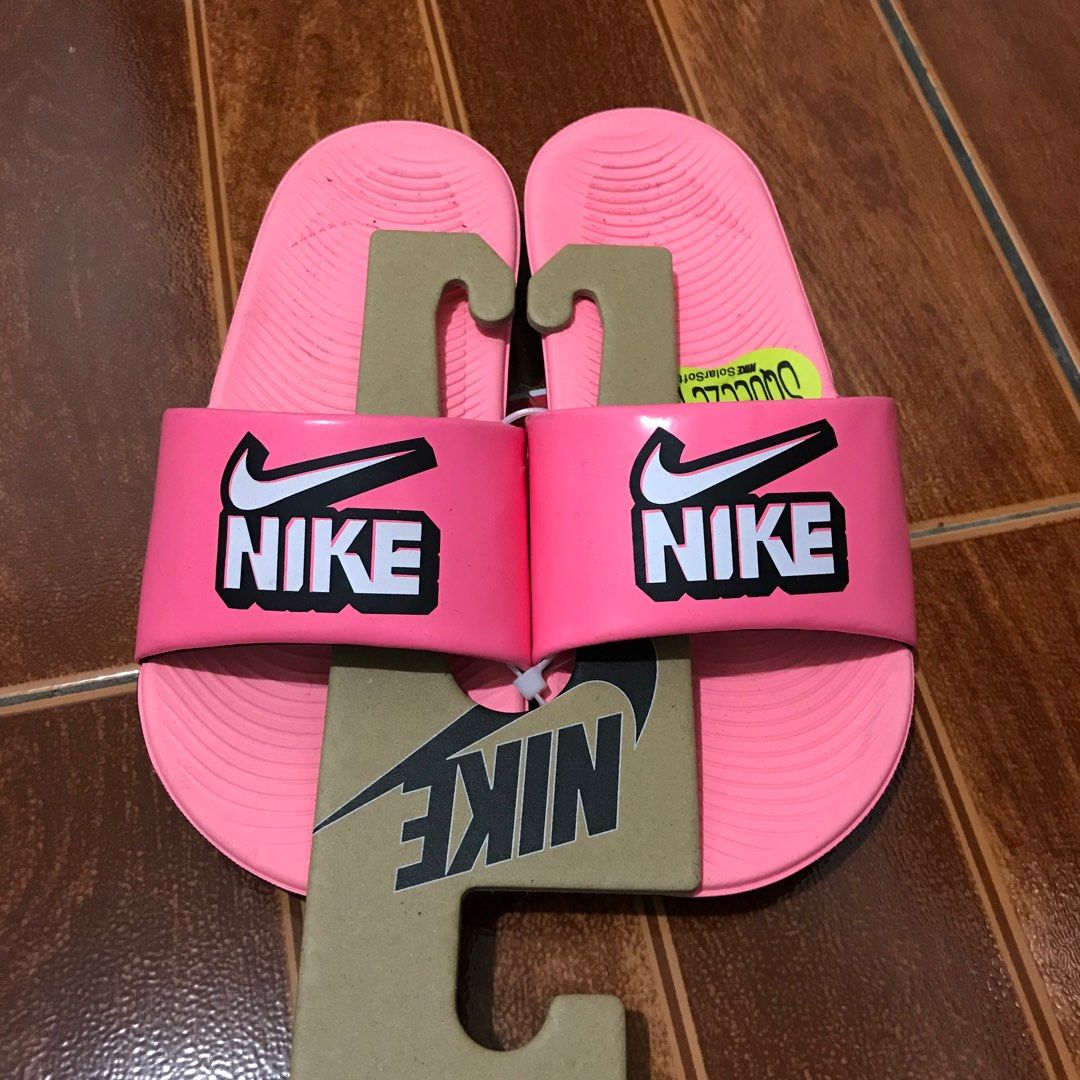 Neon pink 2025 nike slides