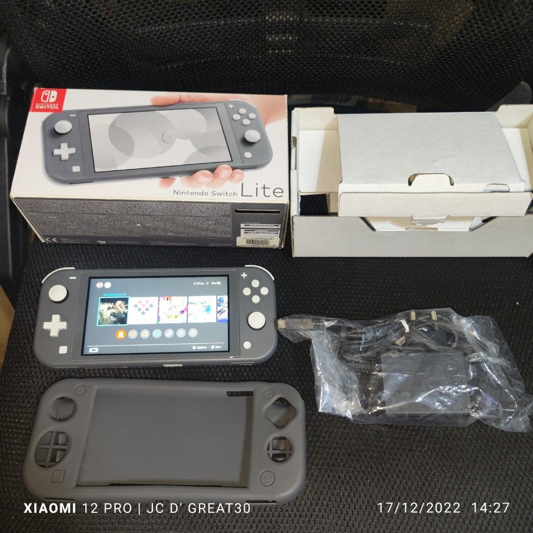 Nintendo switch lite JB modchip 128gb full of games, Video Gaming