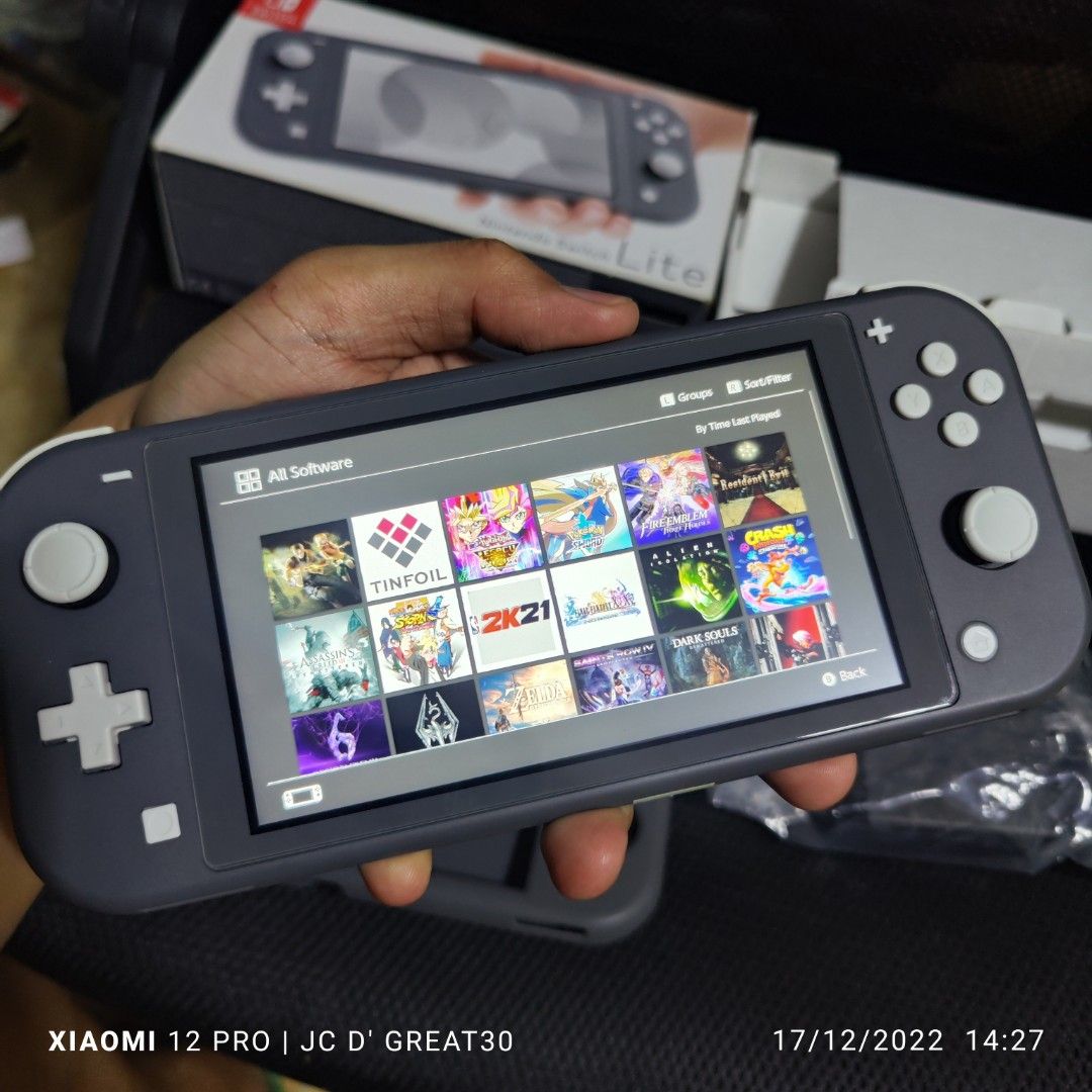 Nintendo switch lite JB modchip 128gb full of games, Video Gaming