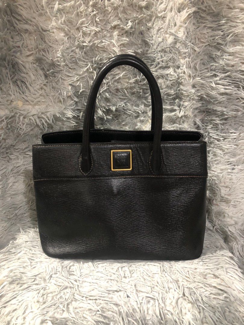 Original Nina Ricci hand bag (Category: Luxury Bags & Wallets) located in Angono. Submitted by fhlor02 (Listing ID 1203735202, Image 1). Description: Original Nina ricci handbag, epi leather material, structured stand alone bag, with slight rubs on d handle at d back part, refer to d last pic uploaded, flaws: inside lining was removed due to stain, again no lining inside, already removed due to stain, last price posted.. very good quality ang lea