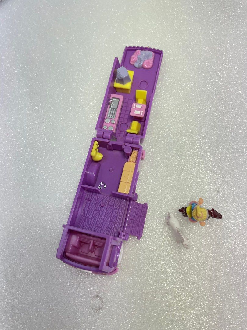 Polly pocket stable shop on the go